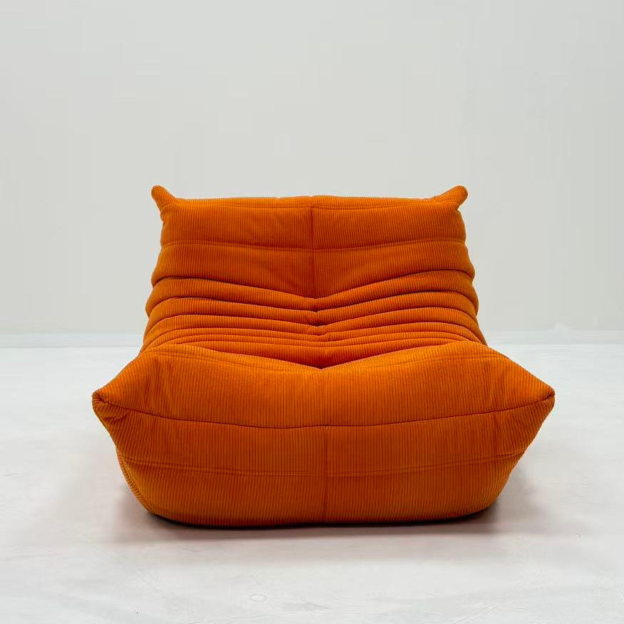 Orange bean bag chair on a white background